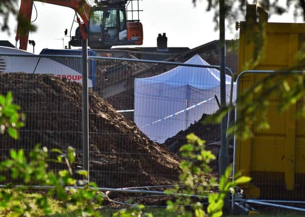 Police have set up a forensic tent on a building site at the former Catherine Dalley House nursing home in Melton
PHOTO TIM WILLIAMS EMN-191018-104739001
