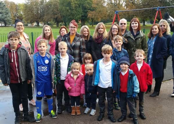 Some of the parents, and their children, who are campaigning for play equipment at Melton's Play Close park to be modernised EMN-191023-101018001