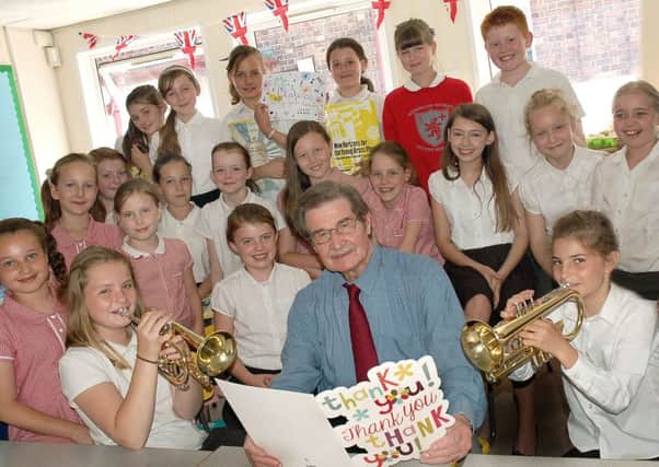 Music teacher Don Blakeson, who has passed away aged 81, pictured four years ago when he retired from teaching pupils how to play instruments at Melton's Brownlow Primary School EMN-191021-172520001