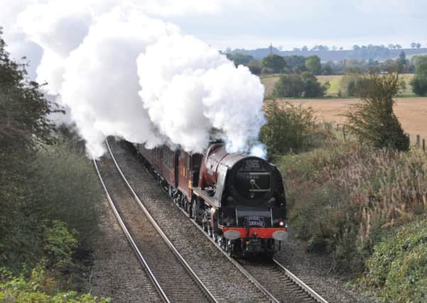 A steam hauled express train hauled by former LMS pacific 6233 Duchess of Sutherland pictured between Langham and Ashwell as it powered its way to Melton staion en route to York
PHOTO PAUL DAVIES EMN-191022-101059001