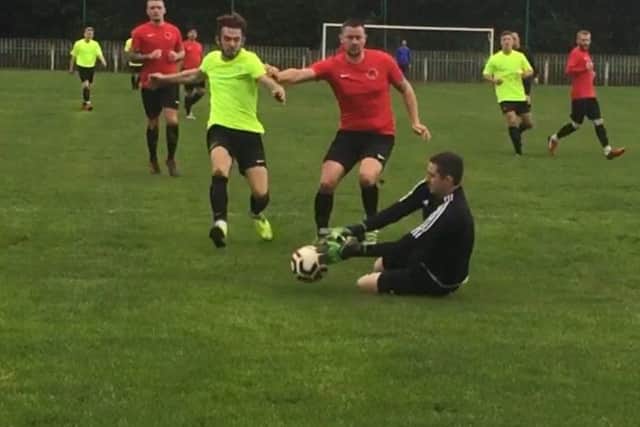 Asfordby striker Rhys Hill is denied EMN-191022-125321002