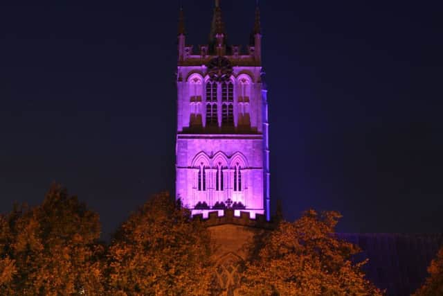St Mary's Church in Melton is lit up purple to mark World Polio Day
PHOTO: Jonny McGrady NEMM EMN-191030-090655001