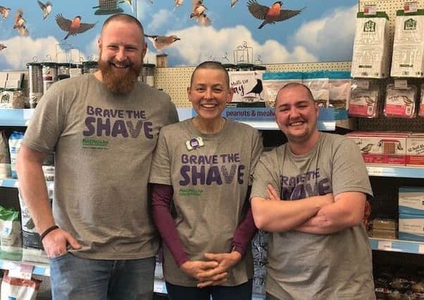 From left, employees at Melton's Pets At Home, Graham Shipton, Helen Rigby and Xander Ambrose, after having their heads shaved for their fundraising effort in support of colleague Lisa Kidd EMN-191030-104510001