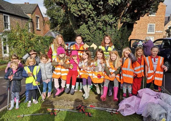 Brownies and Rainbows, who took part in the latest Melton Matters litter pick around St Mary's Church and the skatepark EMN-191024-115804001