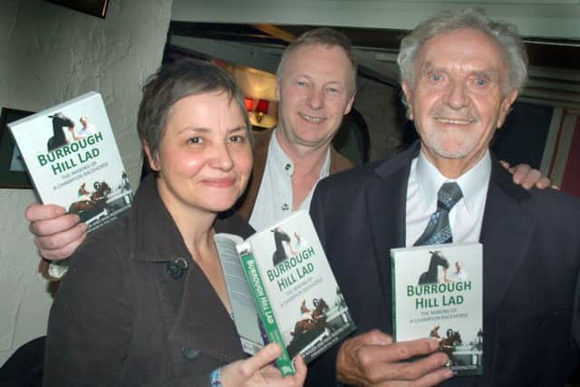 A book was published in 2014 about Stan and his wonder horse. Pictured here with authors Max Riddington and Gavan Naden EMN-191029-163728002