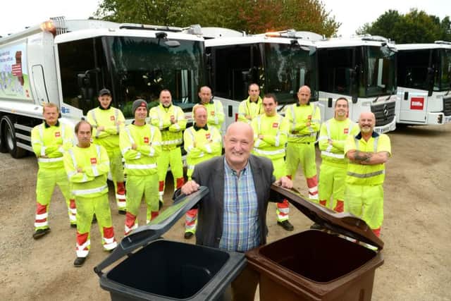Melton Council leader, Councillor Joe Orson, with the authority's new refuse lorries after it had signed a new waste collection contract a year ago with Biffa EMN-191029-171406001