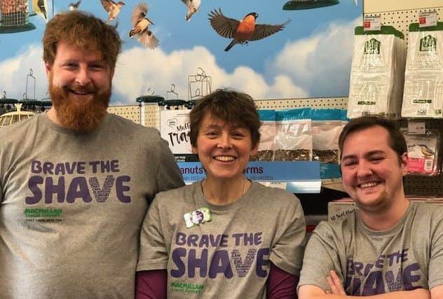 From left, employees at Melton's Pets At Home, Graham Shipton, Helen Rigby and Xander Ambrose, before having their heads shaved for their fundraising effort in support of colleague Lisa Kidd EMN-191030-104520001