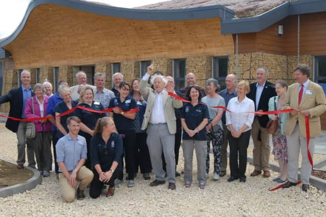 Opening of the new Rutland Water Volunteer Centre by Sir David Attenborough - Sir David cuts the ribbon Photo: MSMP070715-006js