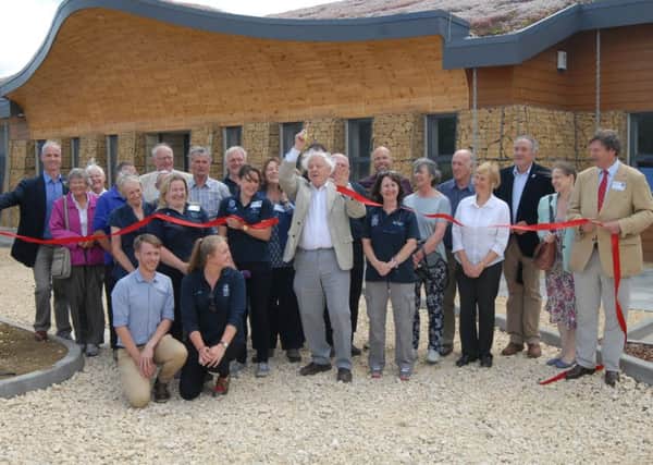 Opening of the new Rutland Water Volunteer Centre by Sir David Attenborough - Sir David cuts the ribbon 
Photo: MSMP070715-006js