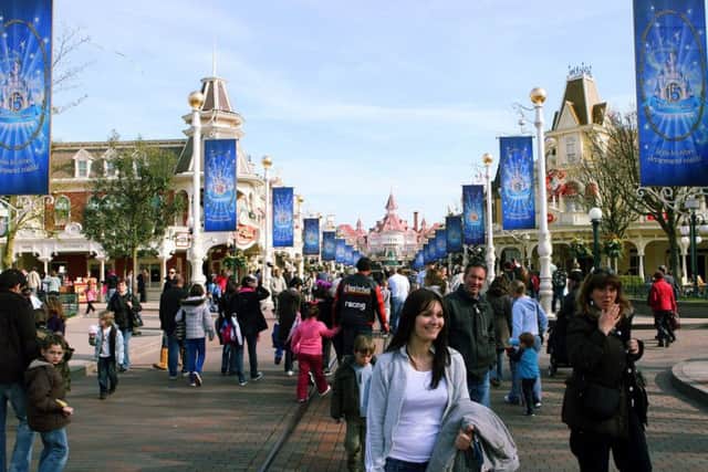 Visitors enjoying Disneyland Paris. Photo: Ian West/PA Wire CONSUMER_Disneyland_085073.JPG