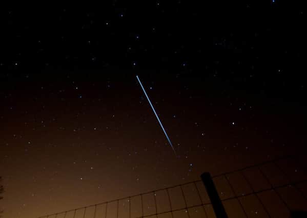ISS in the night sky. Photo: Paul Williams, flickr.com/photos/pcw