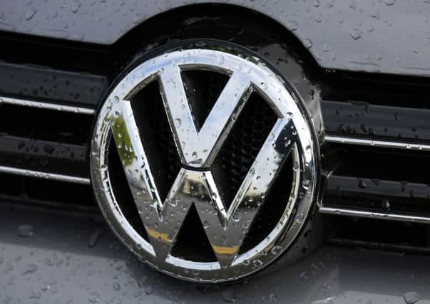 Volkswagen said it would tell customers how to get their cars corrected 6072085a-72fa-477b-9428-eb2ac73d