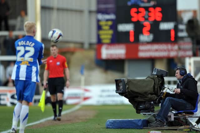 A sky TV cameraman films at a game ENGYPN03820131125141829