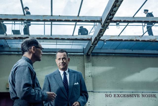 Undated Film Still Handout from BRIDGE OF SPIES. Pictured: Tom Hanks as Brooklyn lawyer James Donovan and Mark Rylance as Soviet agent Rudolf Abel. See PA Feature FILM Reviews. Picture credit should read: PA Photo/Jaap Buitendijk/DreamWorks. WARNING: This picture must only be used to accompany PA Feature FILM Reviews. ANL-151125-103034001