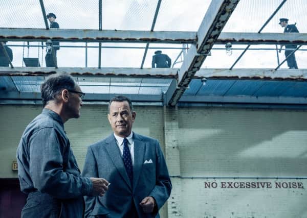 Undated Film Still Handout from BRIDGE OF SPIES. Pictured: Tom Hanks as Brooklyn lawyer James Donovan and Mark Rylance as Soviet agent Rudolf Abel. See PA Feature FILM Reviews. Picture credit should read: PA Photo/Jaap Buitendijk/DreamWorks. WARNING: This picture must only be used to accompany PA Feature FILM Reviews. ANL-151125-103034001