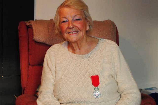 Barbara Kemp wears her Legion dhonneur medal.