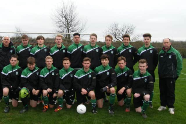 Melton Foxes Under 17s in kit and raintops supplied by sponsors BAC Electrical (Melton) and PlanitX Town and Country Planning Services EMN-151222-123708002
