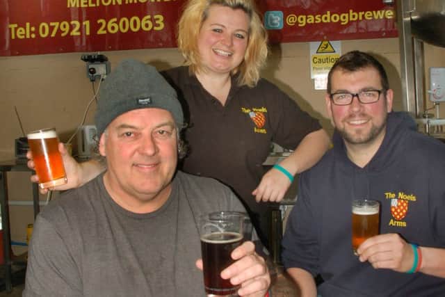Brewer Steve Plews (left) with Noel's Arms landlords Jo Bowtell and Craig Langan EMN-161201-113041001