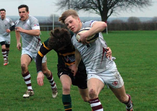 Eighteen-year-old Harry Wood has become a regular on the wing for Melton RFC's First XV this season EMN-160114-093550002