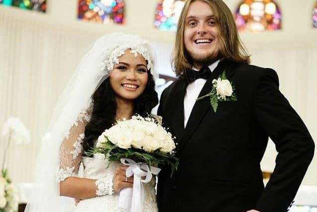 Former Melton man Peter Whitfield and bride Chrestella Tan after their wedding at St Theresia Roman Catholic Church in Jakarta on Saturday EMN-160120-090700001