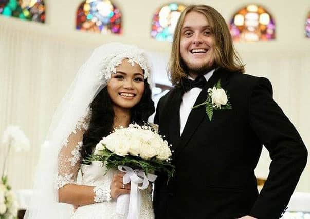 Former Melton man Peter Whitfield and bride Chrestella Tan after their wedding at St Theresia Roman Catholic Church in Jakarta on Saturday EMN-160120-090700001
