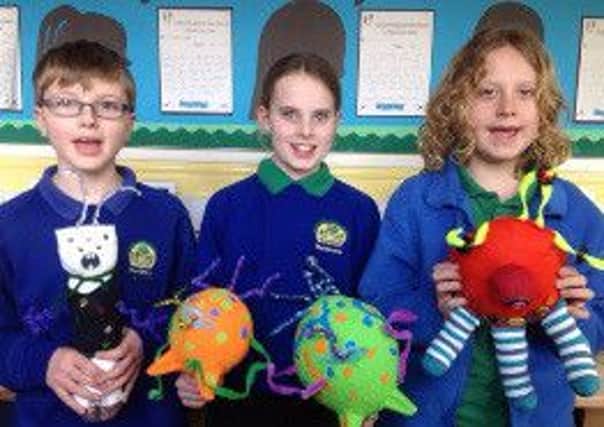 Grove pupils show off their weird and whacky alien creations 
PHOTO: Supplied