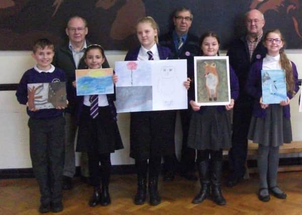Sherard Primary School pupils created some outstanding artwork under the watchful eye of members of the Melton Artists Group 
PHOTO: Supplied