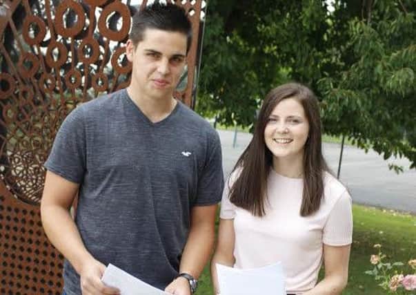 Chessy Browne and Chris Morgan Smith were among Belvoir High School's top GCSE performers last year EMN-160122-155337001