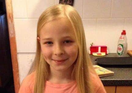 Olivia Garney before her hair cut for charity PHOTO: Supplied