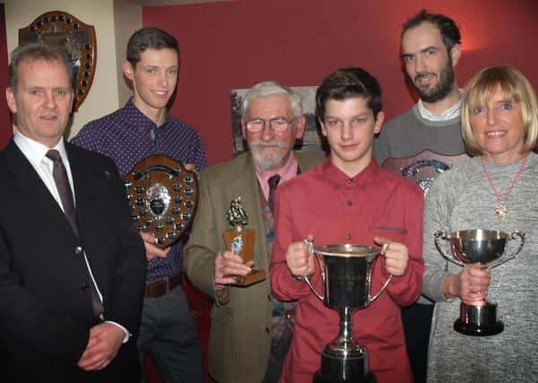 Andrew Thorn (left) with Melton Olympic CC winners EMN-160202-102754002