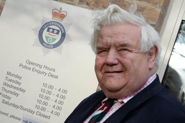 Inspector Lou Cordiner and Rutland County Council leader Roger Begy (Con) open the new police front enquiry desk at Catmose in Oakham. Photo: Alan Walters MSMP-07-01-15-aw001. EMN-150701-105343001