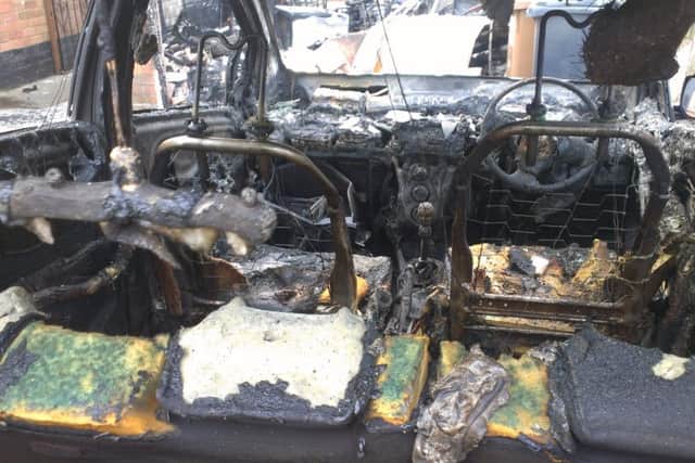 Brian's burnt-out Toyota Yaris EMN-160202-123413001