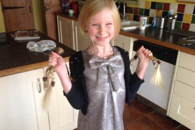 Rose Hardiman (9), after her haircut for the Little Princess Trust