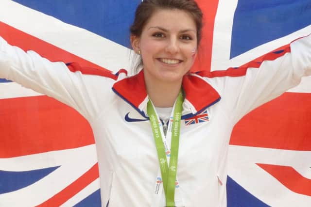 Frisby athlete Mari Smith celebrates winning a team silver medal for Great Britain at the European Cross Country Championships at Toulon EMN-160902-120726002