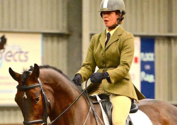 Lisa Freckingham rides Charlie to dressage victory at Vale View EMN-160902-190533002