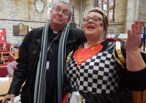 Rev Kevin Ashby with the Queen of Hearts 
PHOTO: Supplied