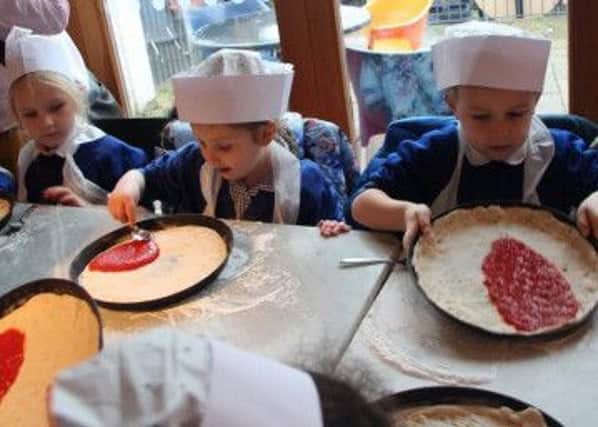 Reception children make pizzas at Melton's Pizza Express 
PHOTO: Supplied