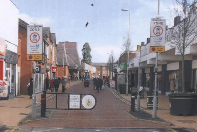 This picture, taken in Wigston, Leicrester, gives an idea of what the new swing gates on Nottingham Street, High Street and King Street will look like. It should be noted this picture is not to scale and that the gates to be implemented in Melton will cover the whole entrances where the bollards used to be EMN-160215-122749001