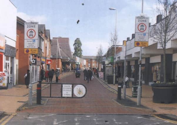 This picture, taken in Wigston, Leicrester, gives an idea of what the new swing gates on Nottingham Street, High Street and King Street will look like. It should be noted this picture is not to scale and that the gates to be implemented in Melton will cover the whole entrances where the bollards used to be EMN-160215-122749001