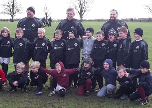 Melton RFC Under 8s pictured in their new warm-up tops sponsored by local business NSC Heating Solutions EMN-160216-181105002