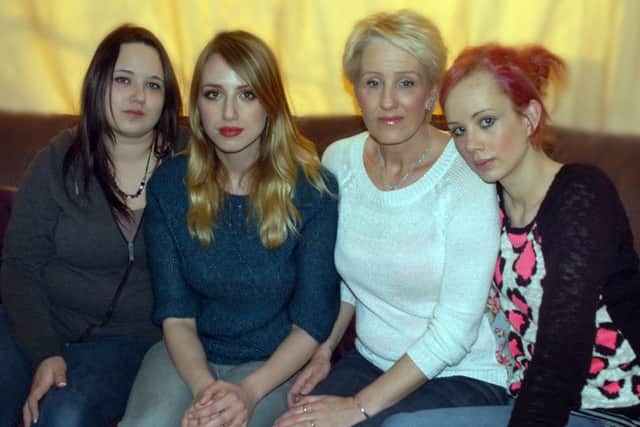 Tracey Fyfe with daughters Emma, Tara and Jess. Picture: Tim Williams EMN-160217-113320001