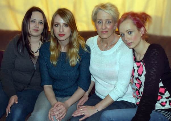 Tracey Fyfe with daughters Emma, Tara and Jess. Picture: Tim Williams EMN-160217-113320001