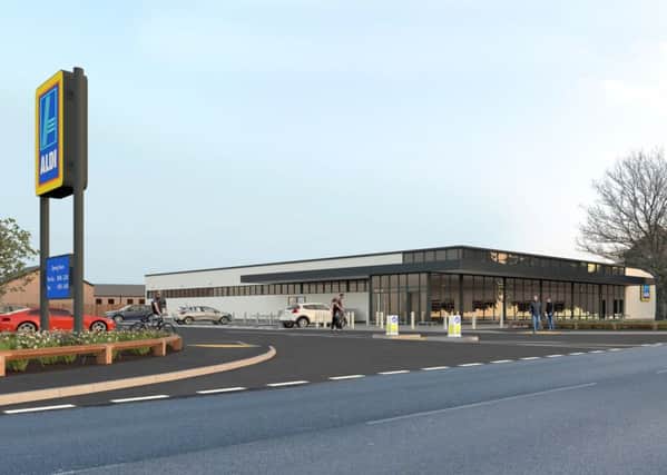 An artist's impression of the proposed new Aldi store EMN-161002-141355001