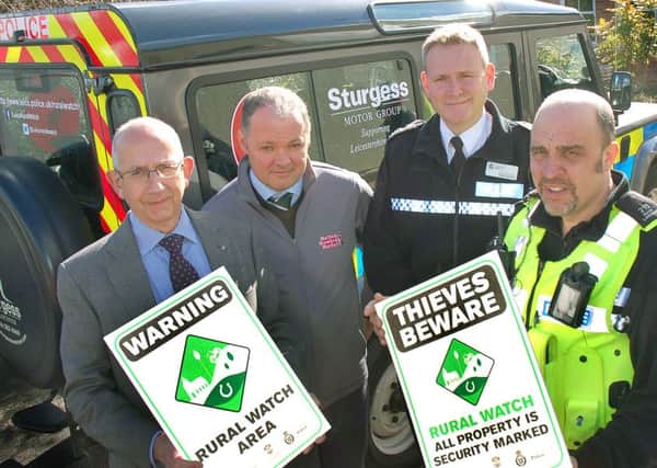 Pictured from left with some of the Rural Watch signs are Stephen Jeal, Melton NFU Mutual senior group secretary, Hugh Brown, cheif executive officer of Gillstream Markets Ltd which manages Melton Market, Leicestershire Police deputy chief constable Roger Bannister and Pc Mark Longden, dedicated neighbourhood officer covering the Vale of Belvoir EMN-160223-175011001