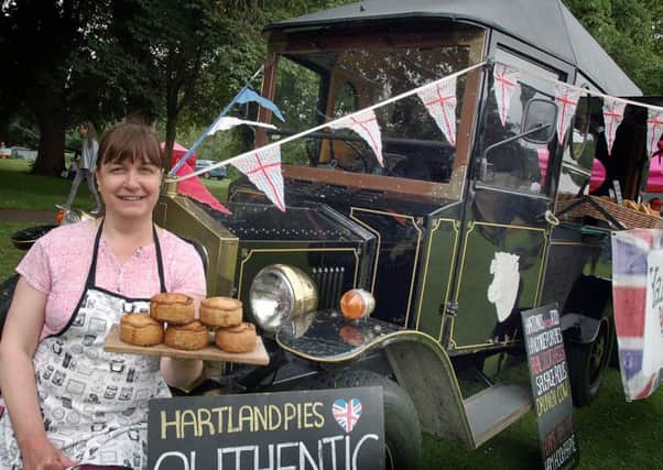 Nicola Hartland displays their pies from their vintage delivery van at last year's (2015) Melton Country Fair EMN-160226-142133001