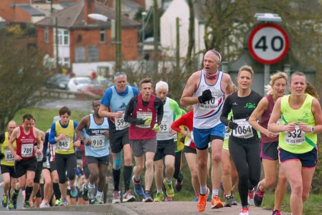 Runners tackle Asfordby Hill during the Stilton Striders' leg of the county road running winter league EMN-160229-142859002