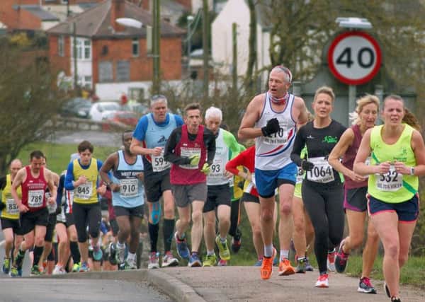Runners tackle Asfordby Hill during the Stilton Striders' leg of the county road running winter league EMN-160229-142859002