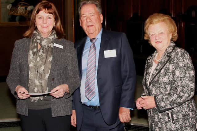 From left are Dove Cottage Day Hospice manager and founder Chris Gatfield, David Hagger, head of the Leicestershire and Rutland Freemasons, and the Lord-Lieutenant of Leicestershire, Jennifer, Lady Gretton EMN-160203-103838001