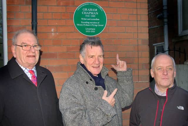 Michael Palin (centre) unveils a county council plaque at Graham Chapman's former home on Burton Road, Melton, in December 2014 as Graham's brother Dr John Chapman (left) and County Hall leader Nick Rushton look on EMN-160203-114642001