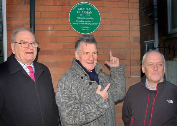 Michael Palin (centre) unveils a county council plaque at Graham Chapman's former home on Burton Road, Melton, in December 2014 as Graham's brother Dr John Chapman (left) and County Hall leader Nick Rushton look on EMN-160203-114642001